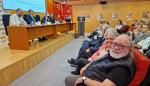 El consejero de Sanidad ha inaugurado la jornada celebrada en el Clínico. En primer plano, Luis Marco, primer paciente que recibió un trasplante hepático en Aragón