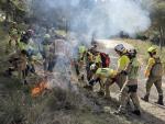 Un momento del simulacro que la Academia Aragonesa de Bomberos ha realizado en La Muela.