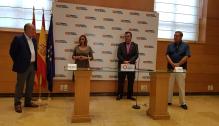 Mayte Pérez y Luis Zubieta, en la firma de los convenios entre el Gobierno de Aragón y la FAMCP