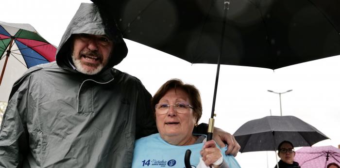 La XIV Marcha de Aspace Huesca ha cubierto su recorrido este domingo con récord de participantes a pesar de la lluvia