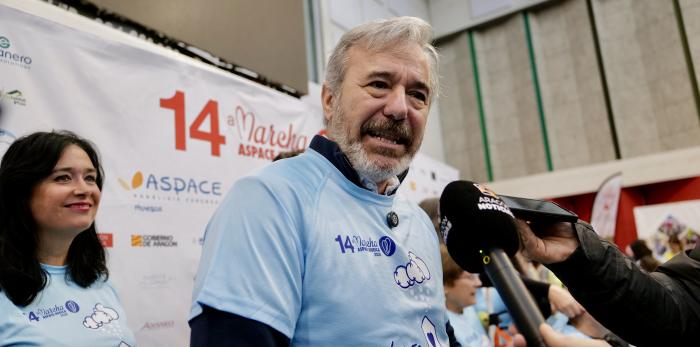 La XIV Marcha de Aspace Huesca ha cubierto su recorrido este domingo con récord de participantes a pesar de la lluvia